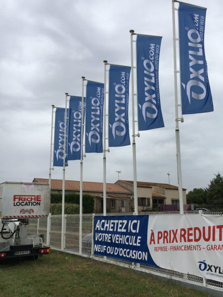 Oxylio enseigne drapeaux publicitaire Montpellier Lattes